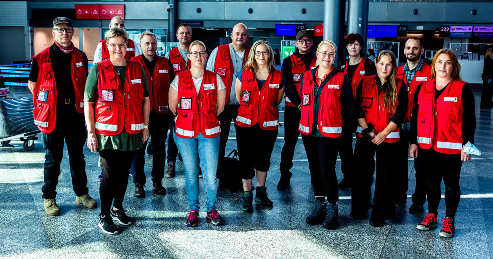 Group picture of Finnish Red Cross delegates at the airport before going to Haiti in 2021.